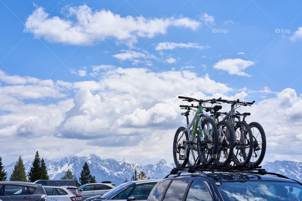 Four bikes on the top of the car