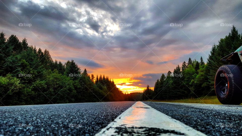 Road against cloudy sky