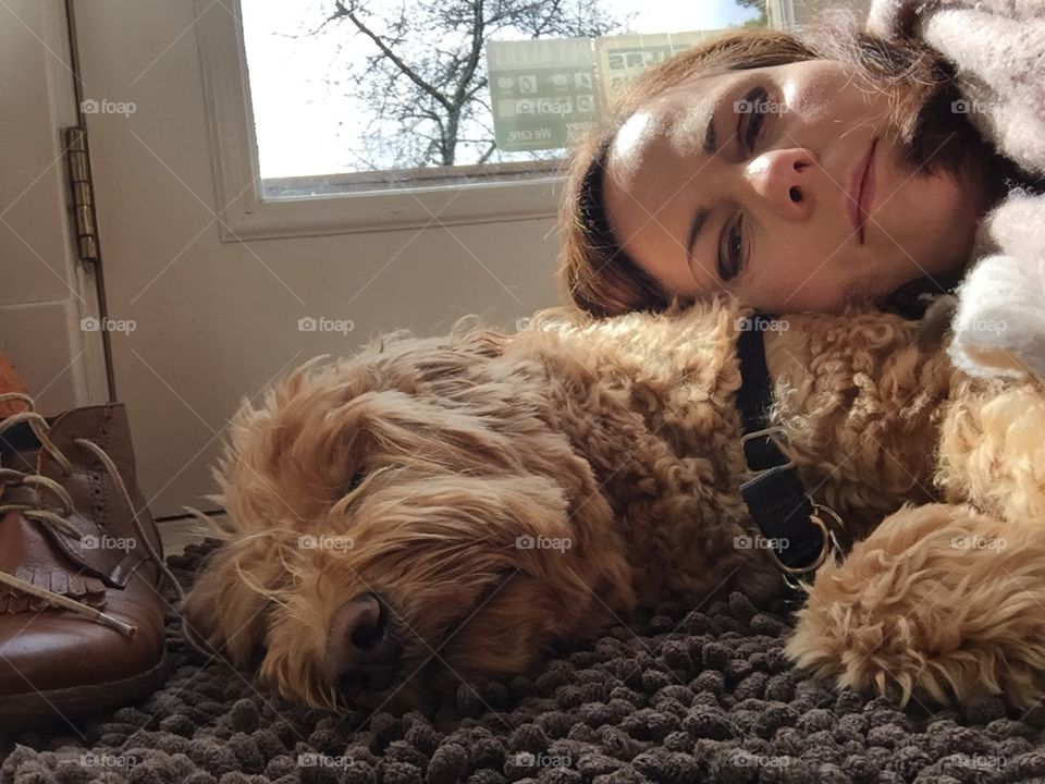 Selfie as I bask in the winter sun while costing up to an exhausted Australian labradoodle 