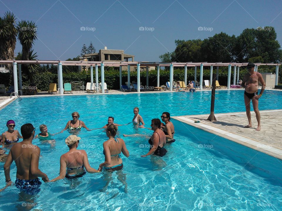 Early summer swimming  - aerobics time in swimming pool