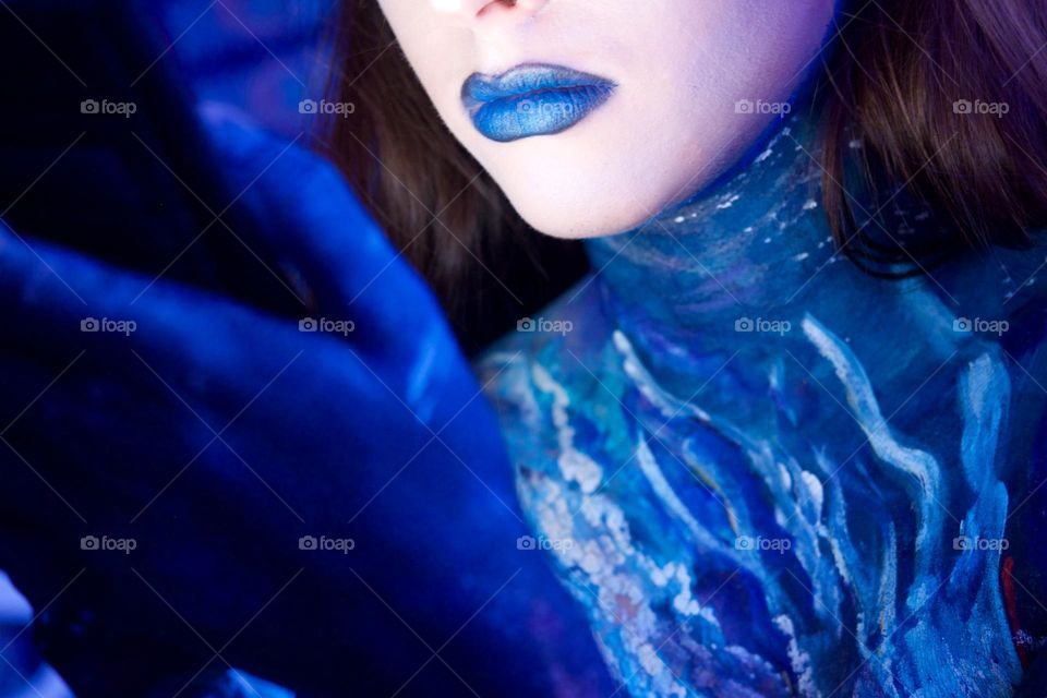 Blue color burst lips and body paint