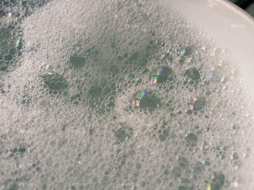 Tiny Soap Bubbles in Water