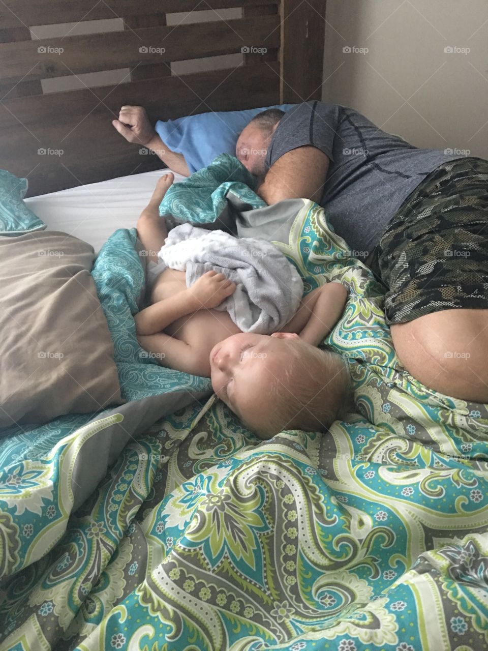 Grandfather and grandson sleeping 