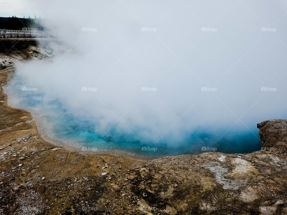 Deceptively inviting blue of a thermal spring in Yellowstone National Park