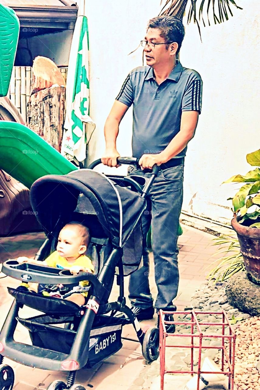 Grandad taking care of Grandson.