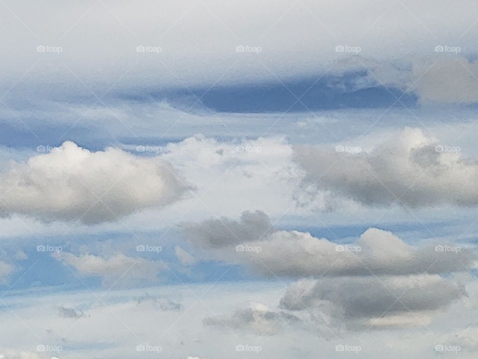 The fluffiest clouds in the bluest skies.
