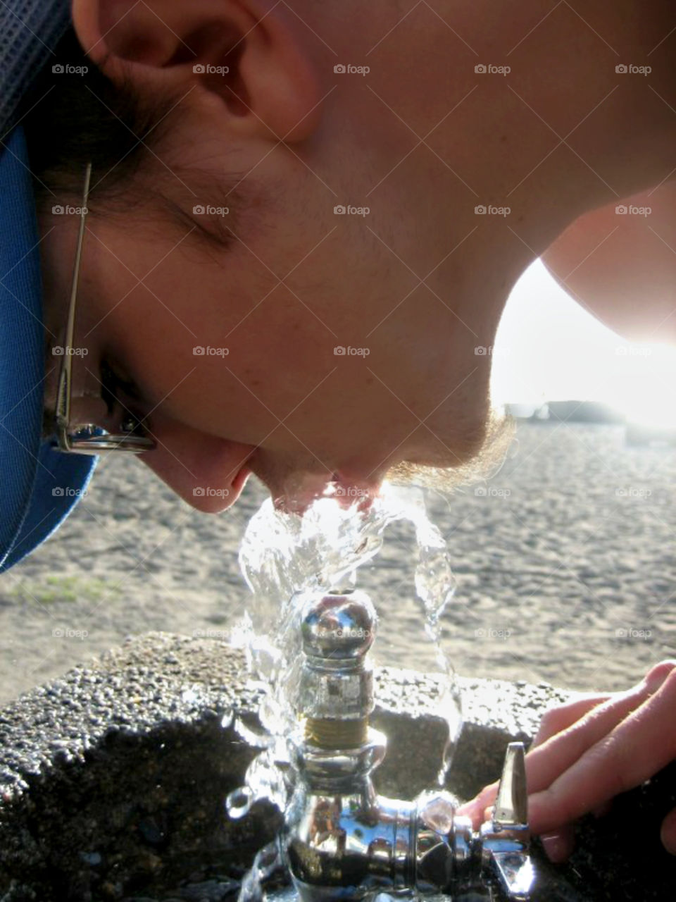 Drinking From a Water Fountain on the Beach, Hot Summer Adventure Day Man Guy 