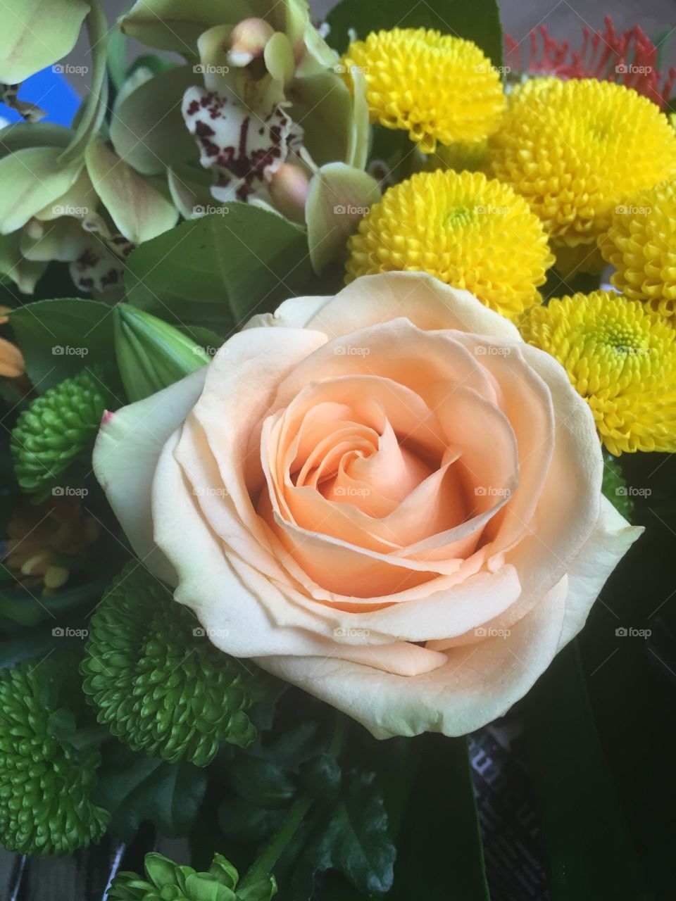 Close up of bouquet with peach rose