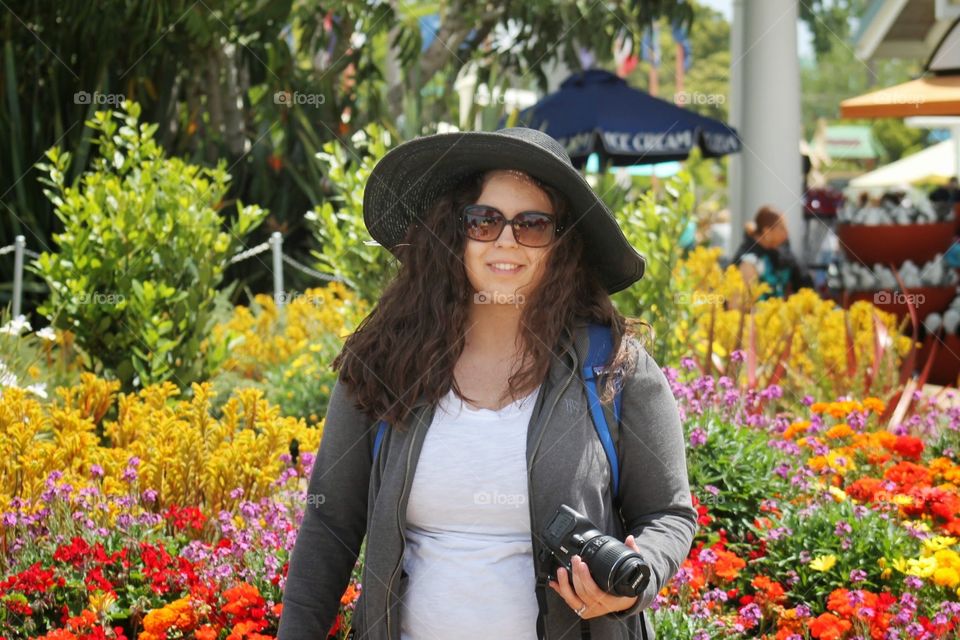 Sunshine and Flowers. Nice range of colorful flowers in the background.