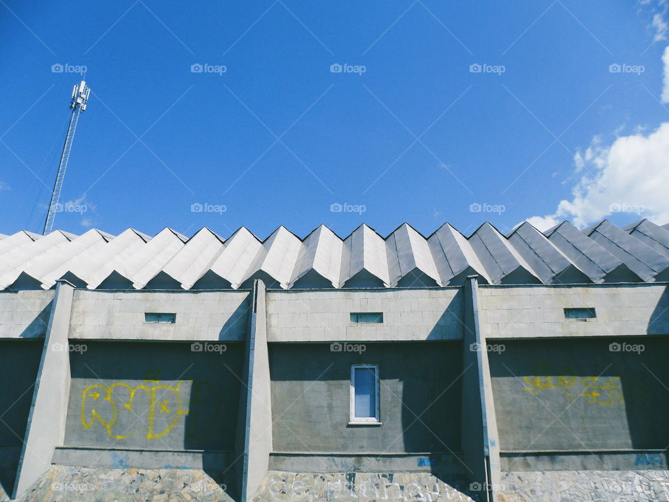 roof of a building against a blue sky