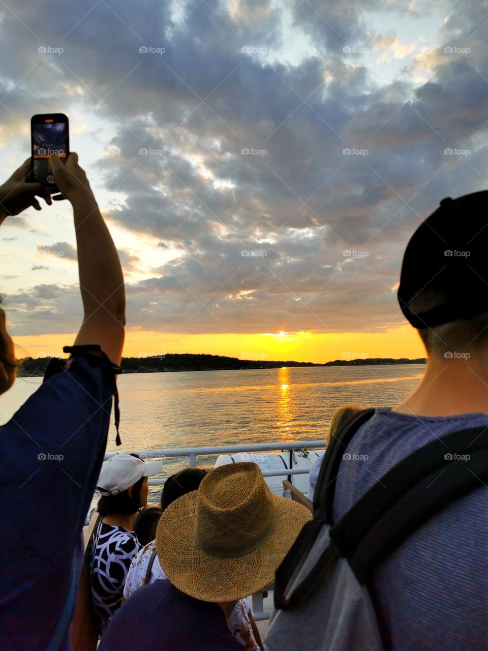 People looking at the sunset