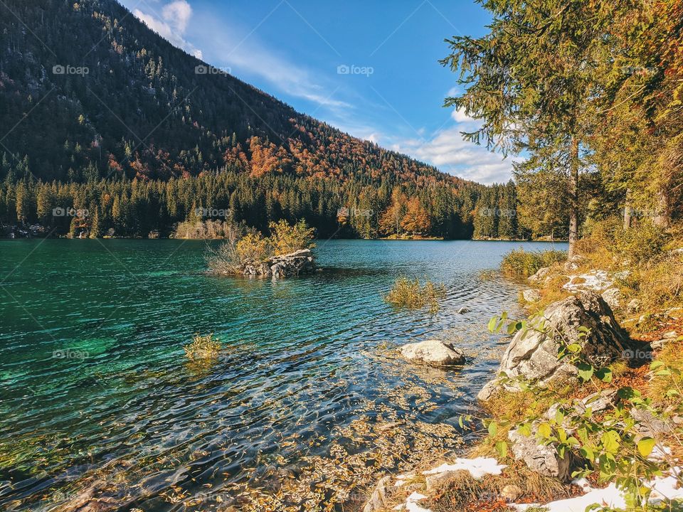 Scenic view at the mountain peaks above the lake.