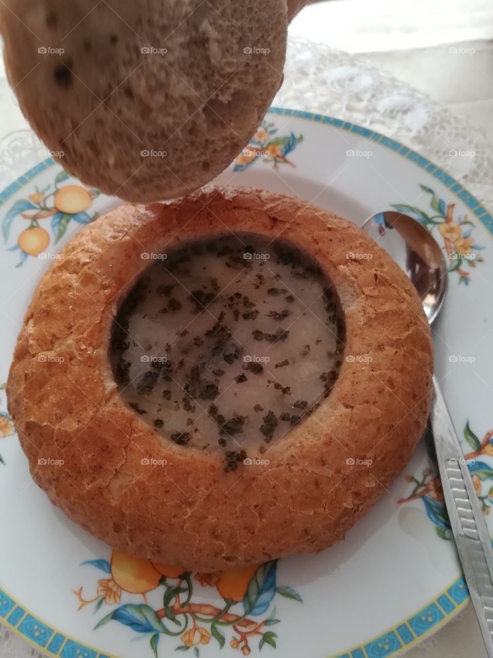 Traditional white broth in bread