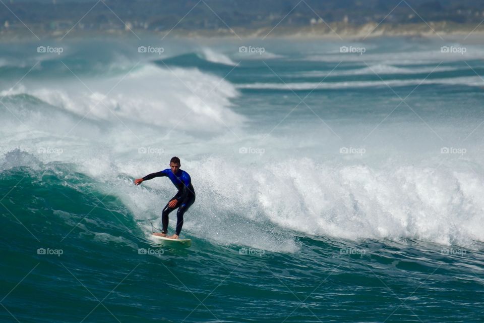 Surfer on a wave 