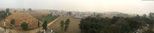 This is panorama picture of my whole village jn india. It include all things like fields garden all our houses  one of my favorite pictures 