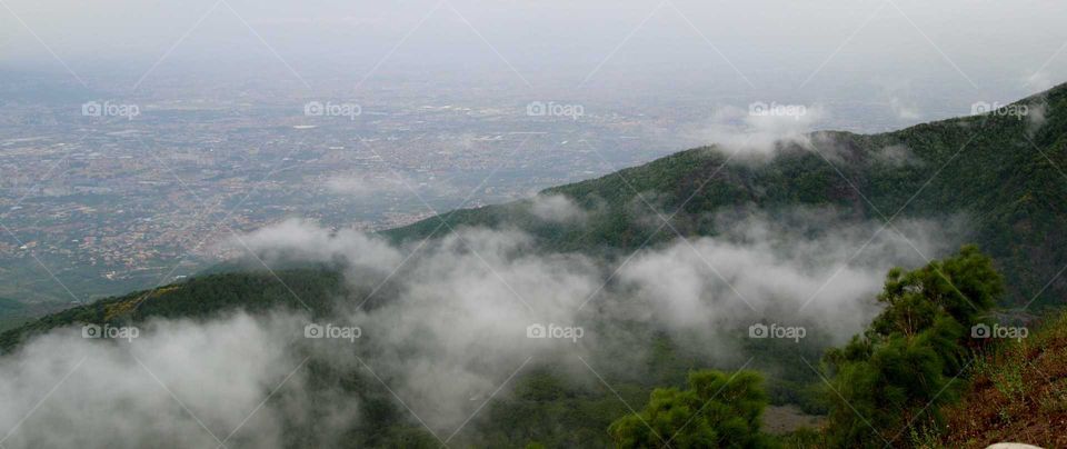 view from mount Vesuvius in Italy over the forest and the city