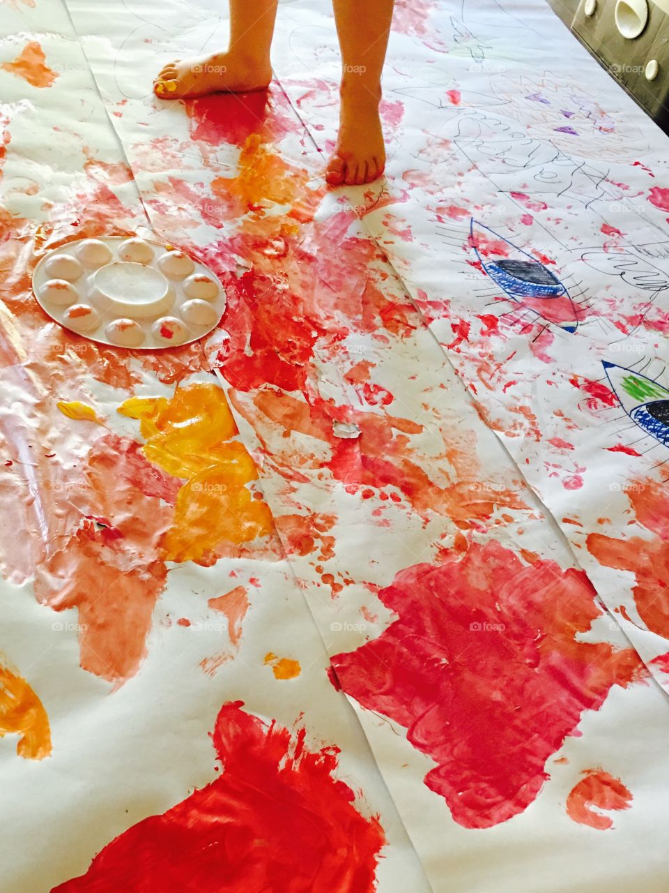 Kids painting on the table
