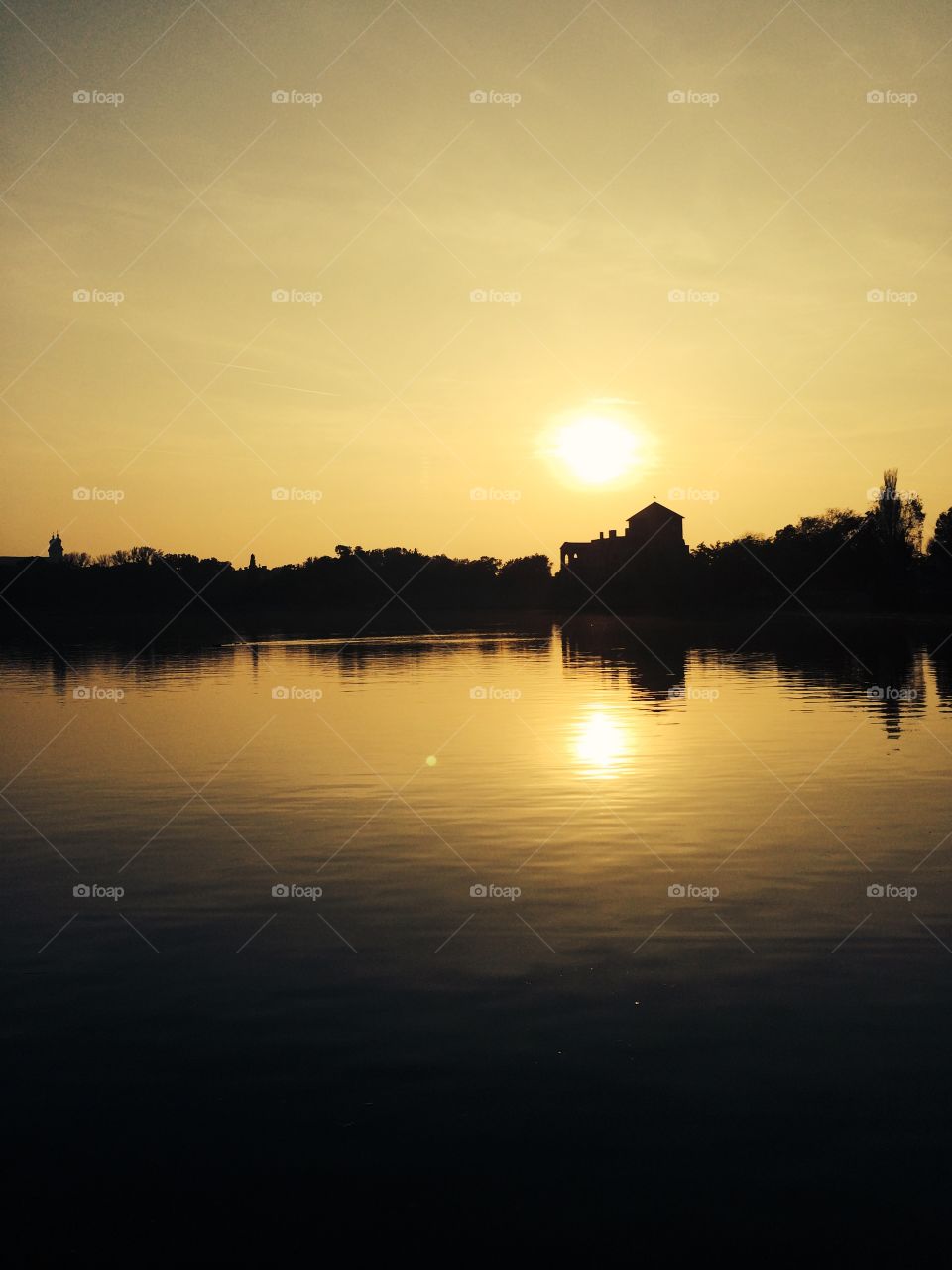 Sunset at Lake Tata. Orange reflection.
