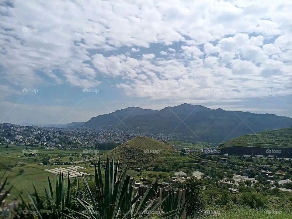 Glory be to God, the magnificent and picturesque view and the natural green trees are a view that is nothing more wonderful than it