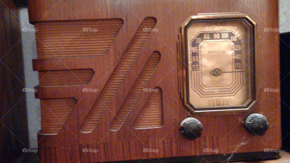 extremely old radio. this radio is wooden and extremely old
