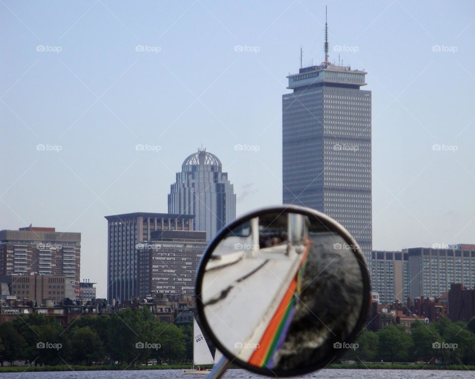 Reflecting in the rear view mirror on the Charles river