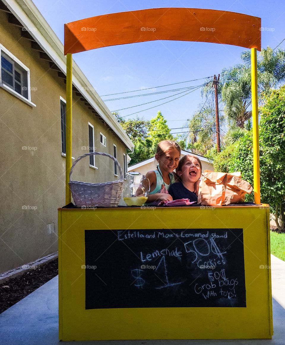 Sibling enjoying near building