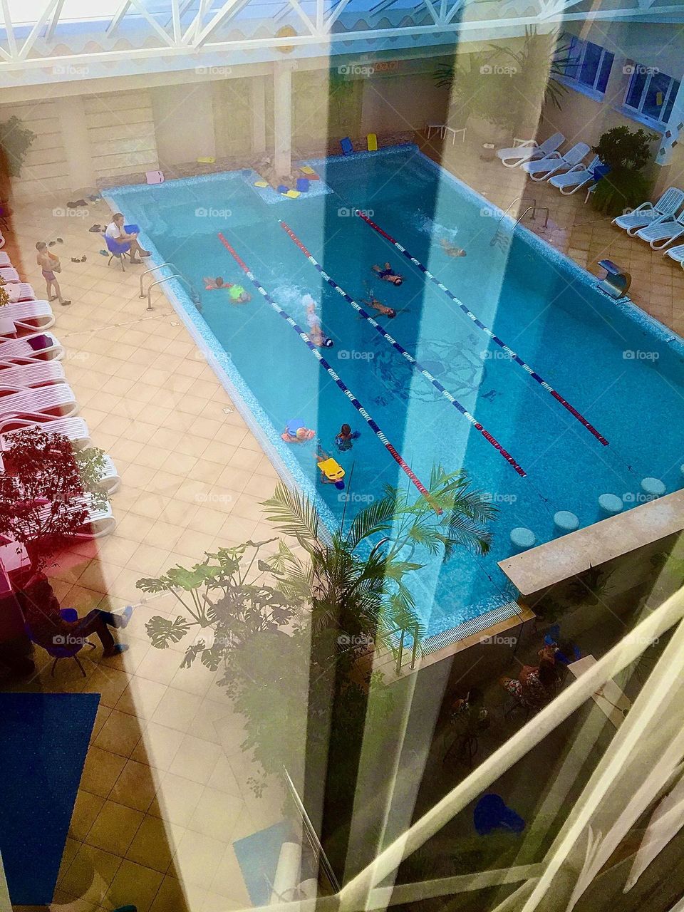 Indoor warm swimming pool by day