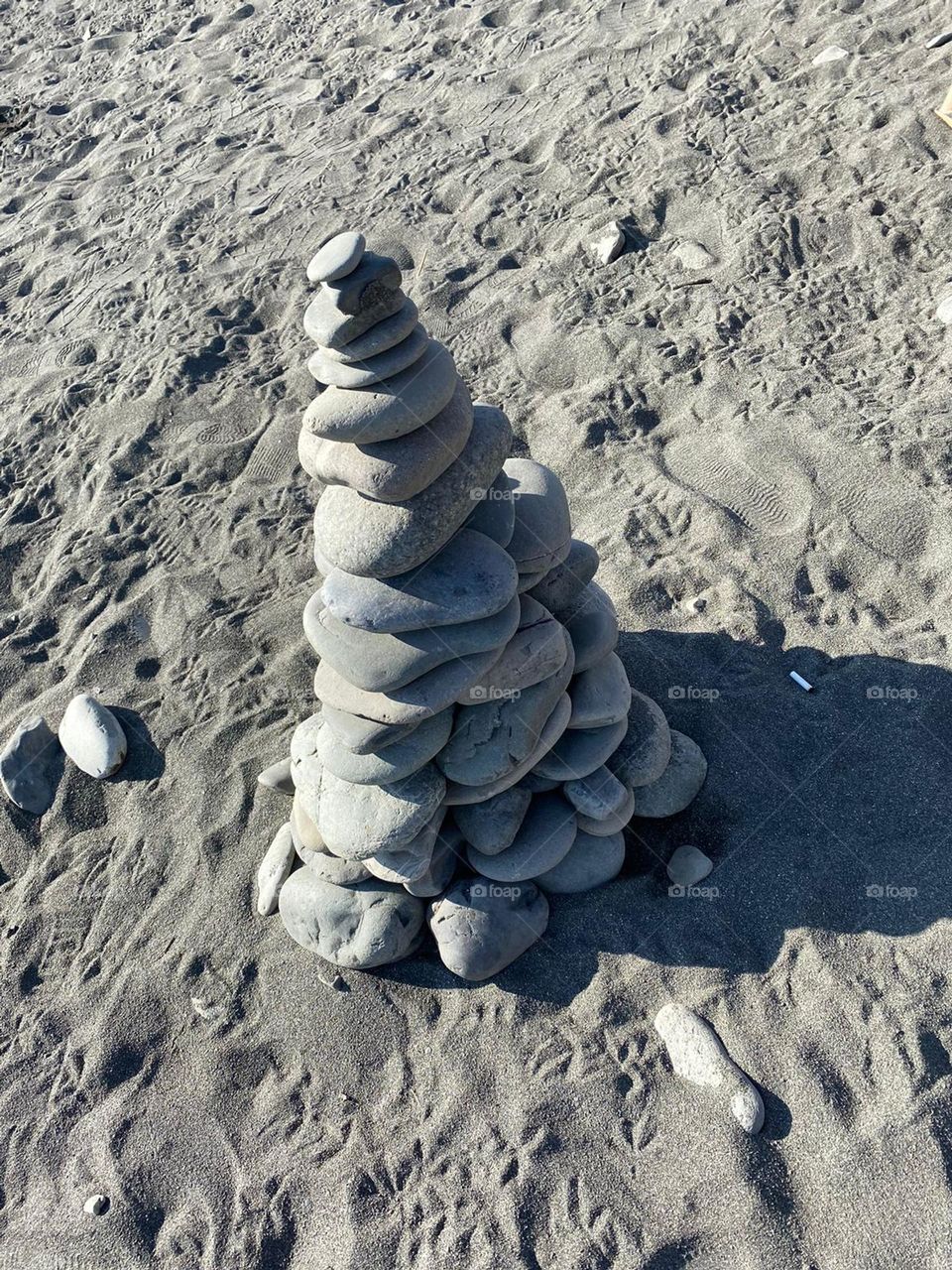 construction of sea stones on a sunny day on the Black Sea coast