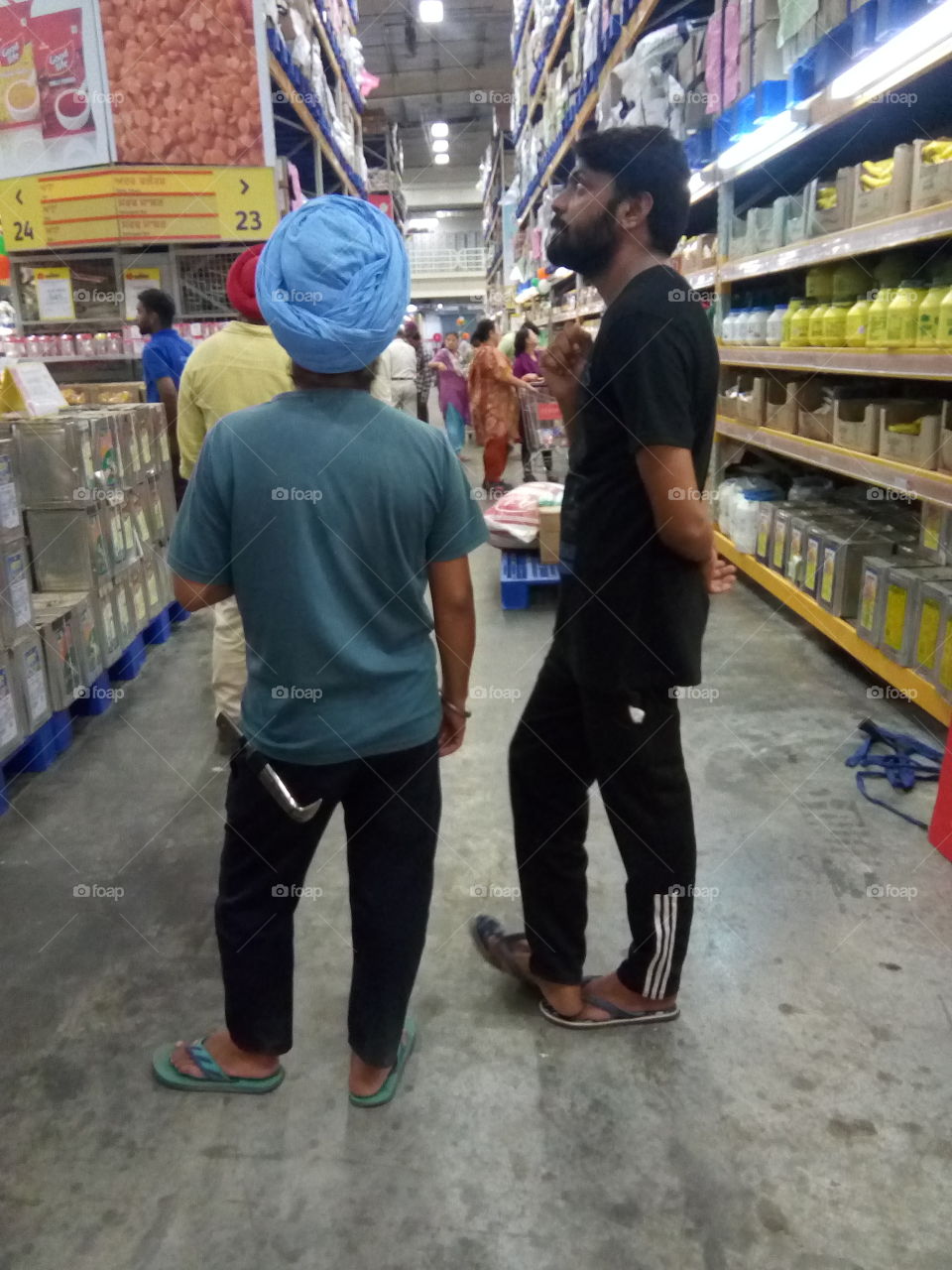 people in a shopping mall in India