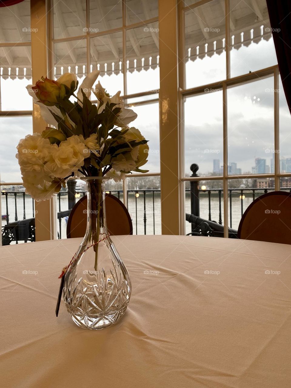 Flowers in the vase on the table 