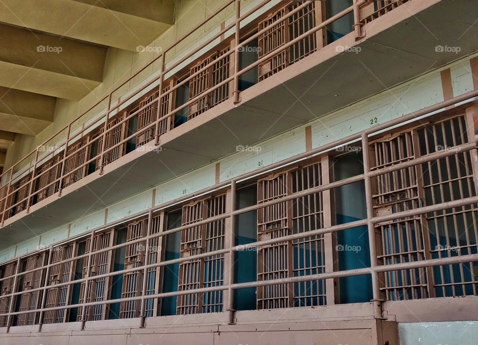 Prison Cell Block. Imposing Steel Bars Of A Block Of Prison Cells
