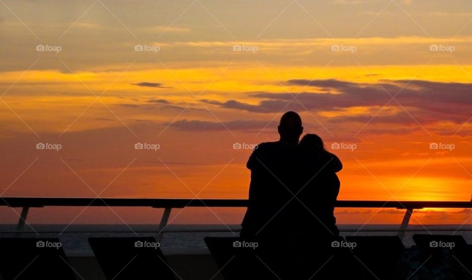 Loving couple in sunset
