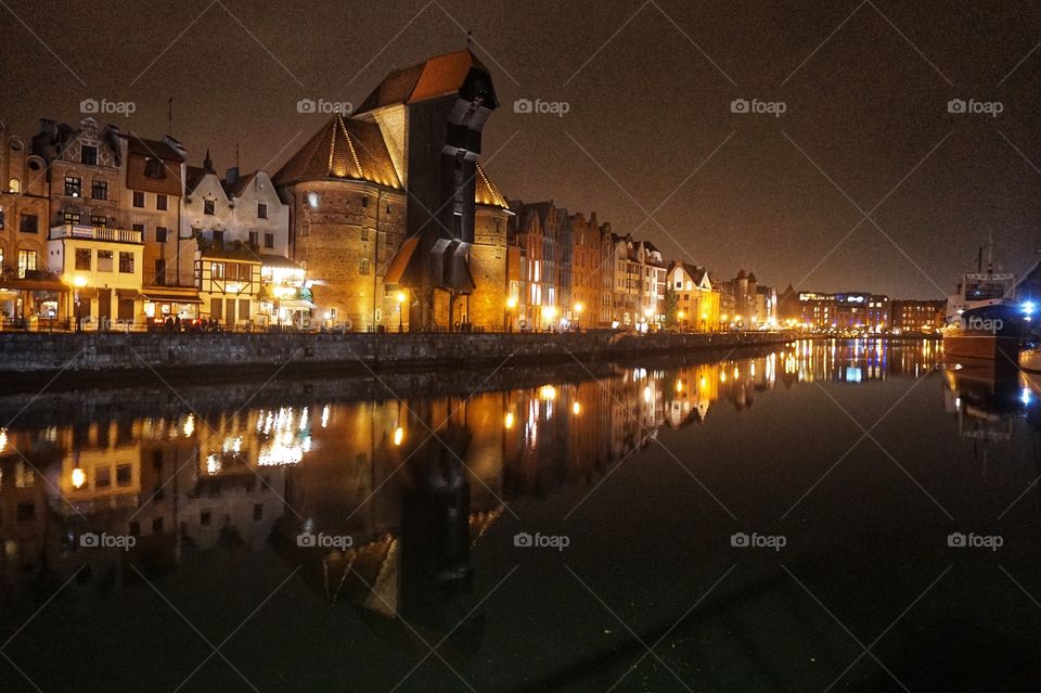 Beautiful Old Town Gdańsk lit up at night 