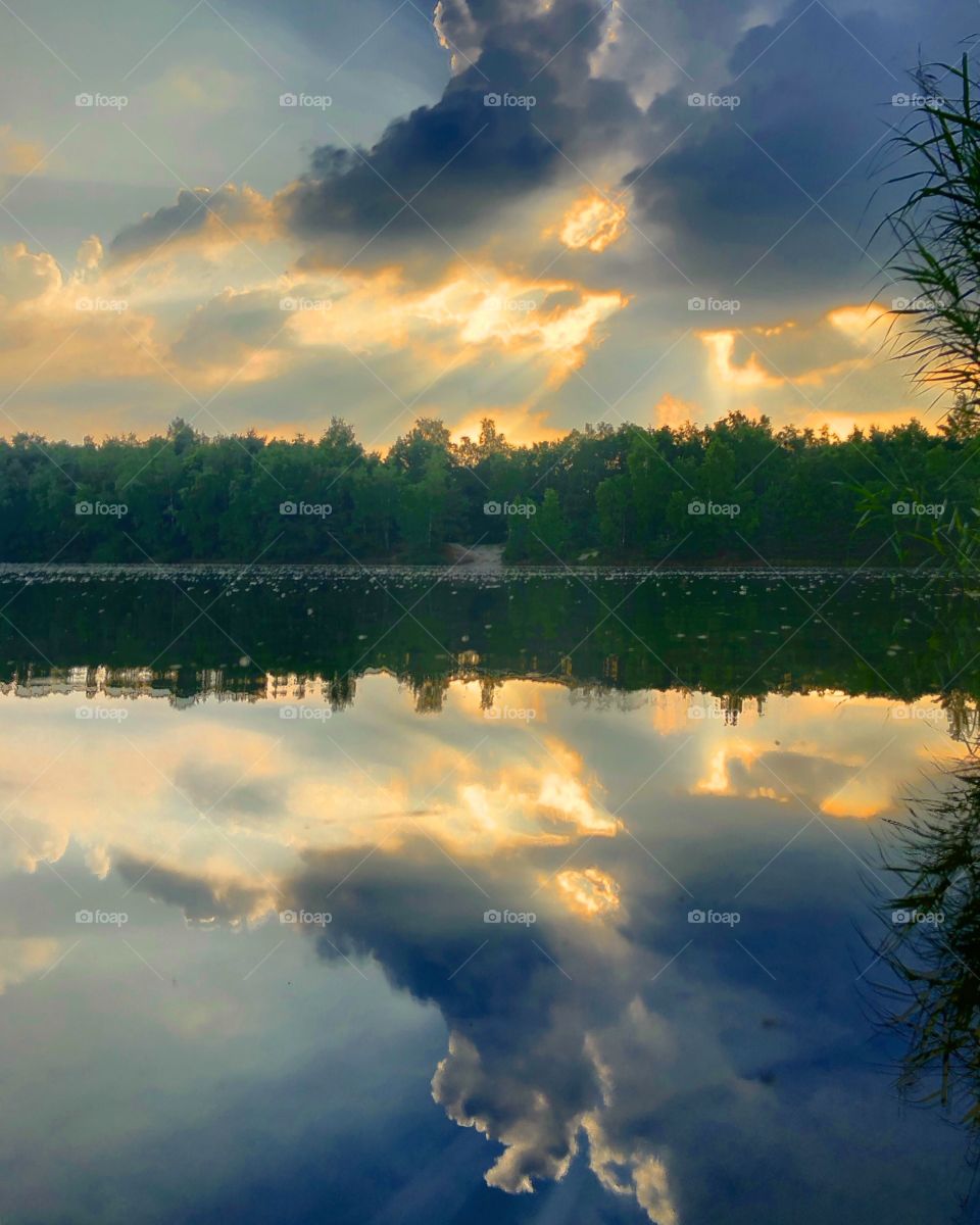 Sunset reflected in the water of the lake