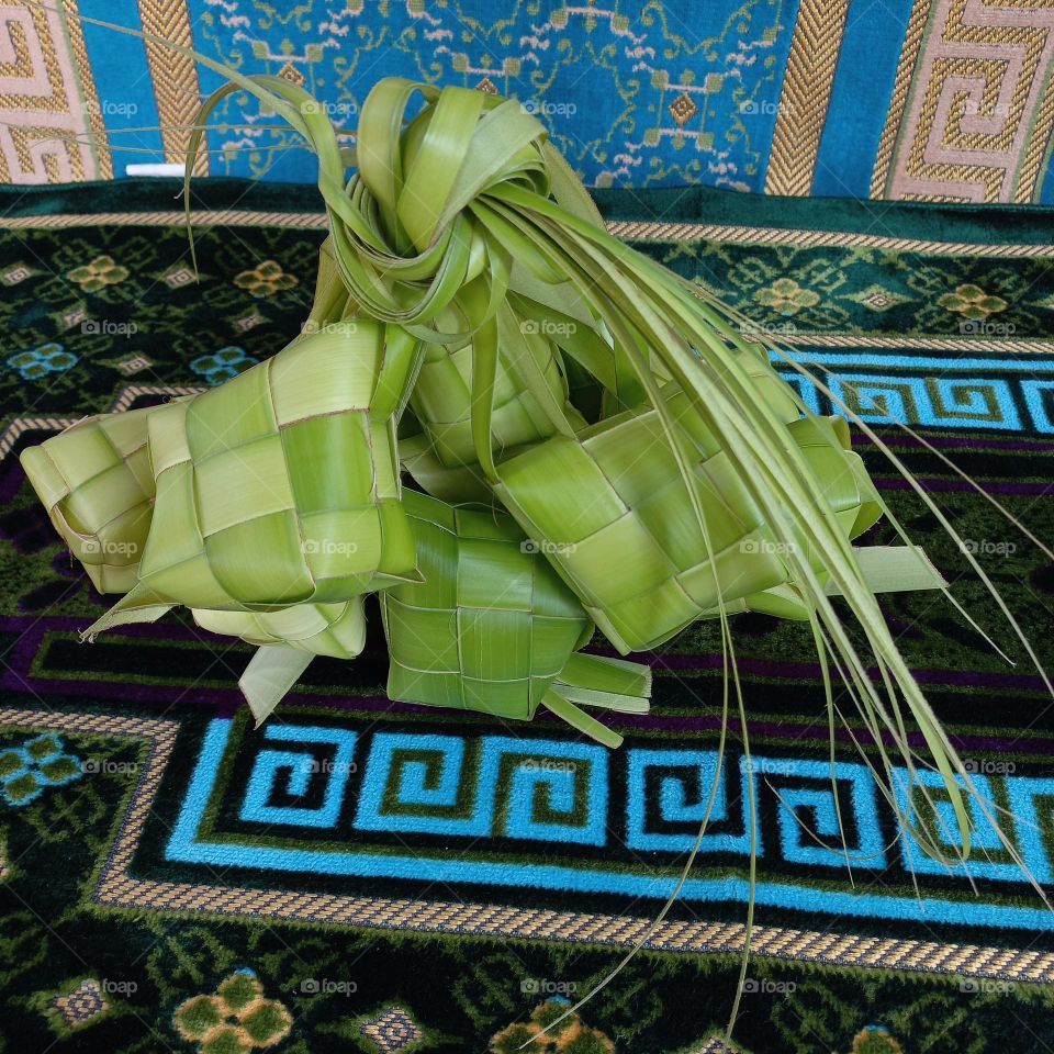 This is called a ketupat where food is often made during the month of Ramadan and holidays