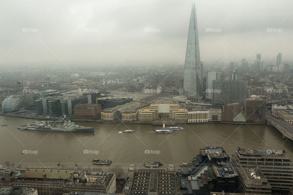 Bird’s eyed view of Thames River and buildings in London, UK