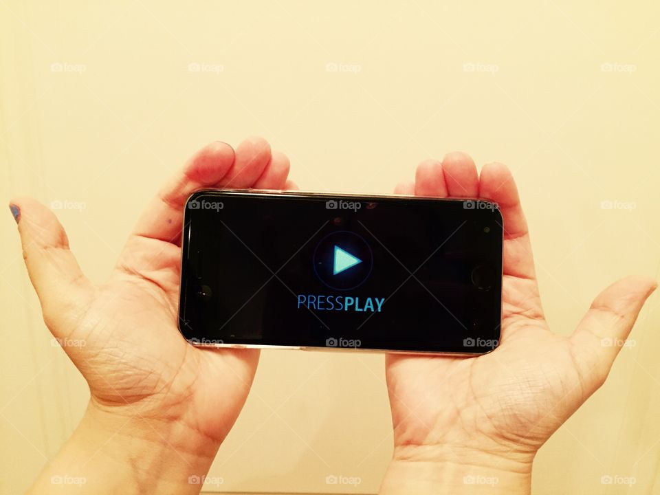 Press Play. Watching videos online or on your cellphone