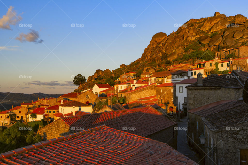Sunset over the medieval mountain village Monsanto, Portugal.