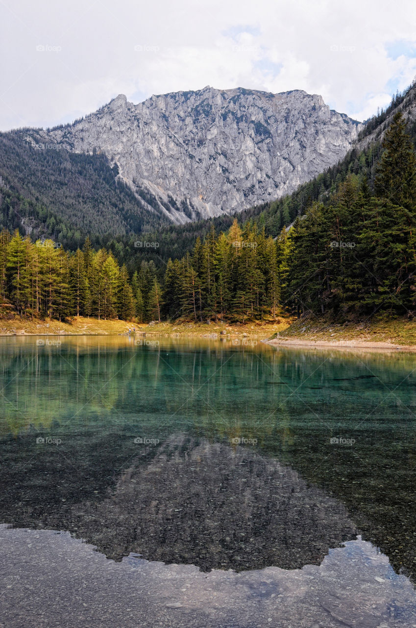 Hiking around the green lake at styria, austria