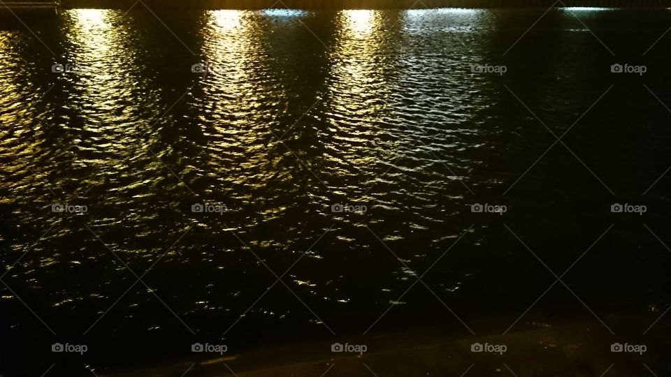 lights reflecting on water