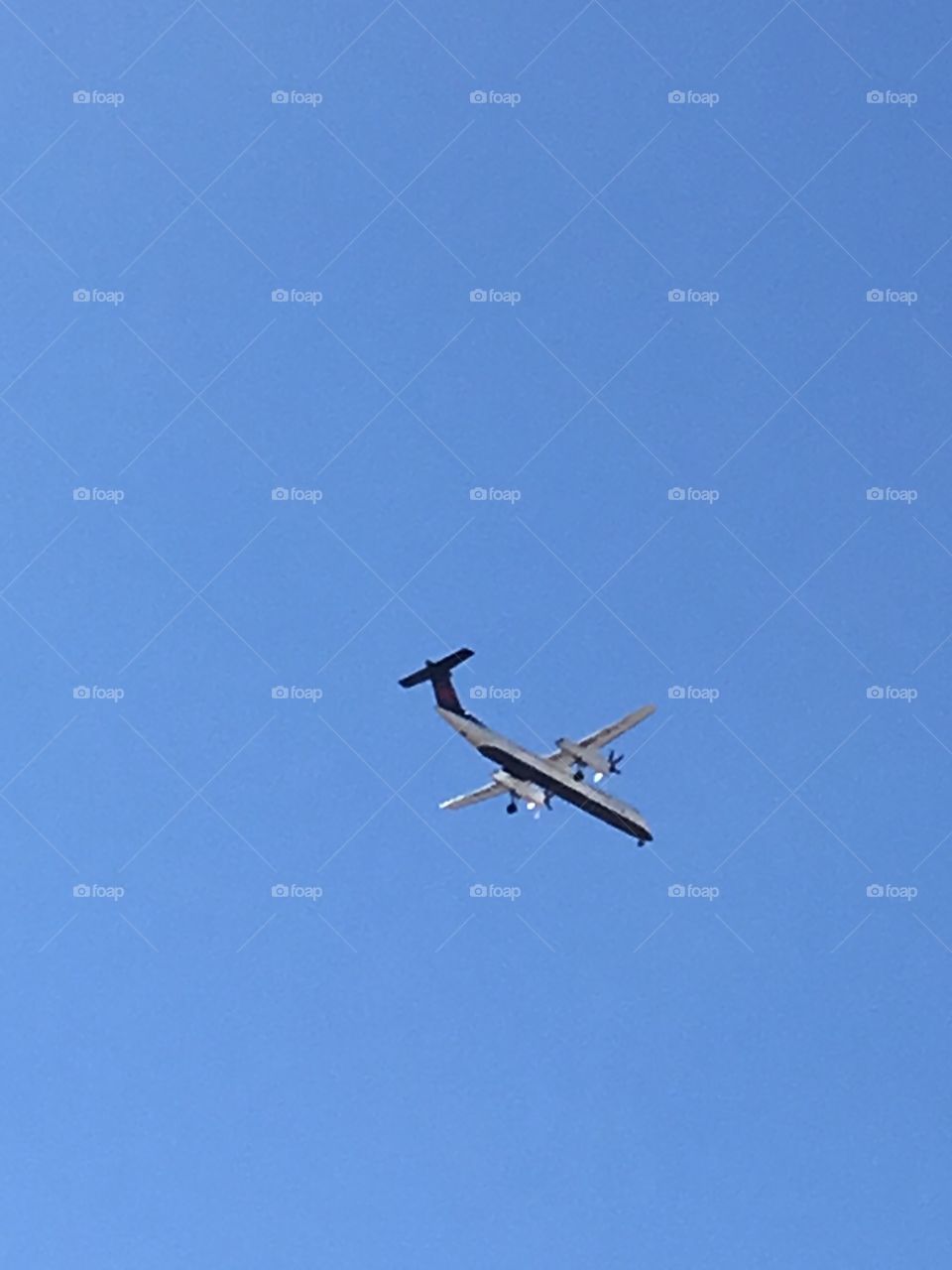 Airplane flying overhead 