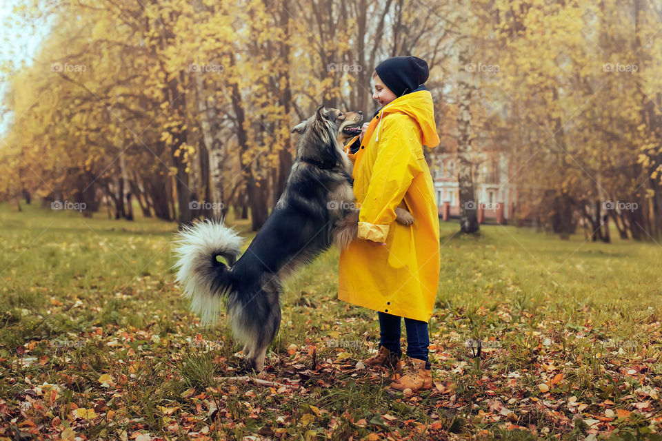 dog hugs a man