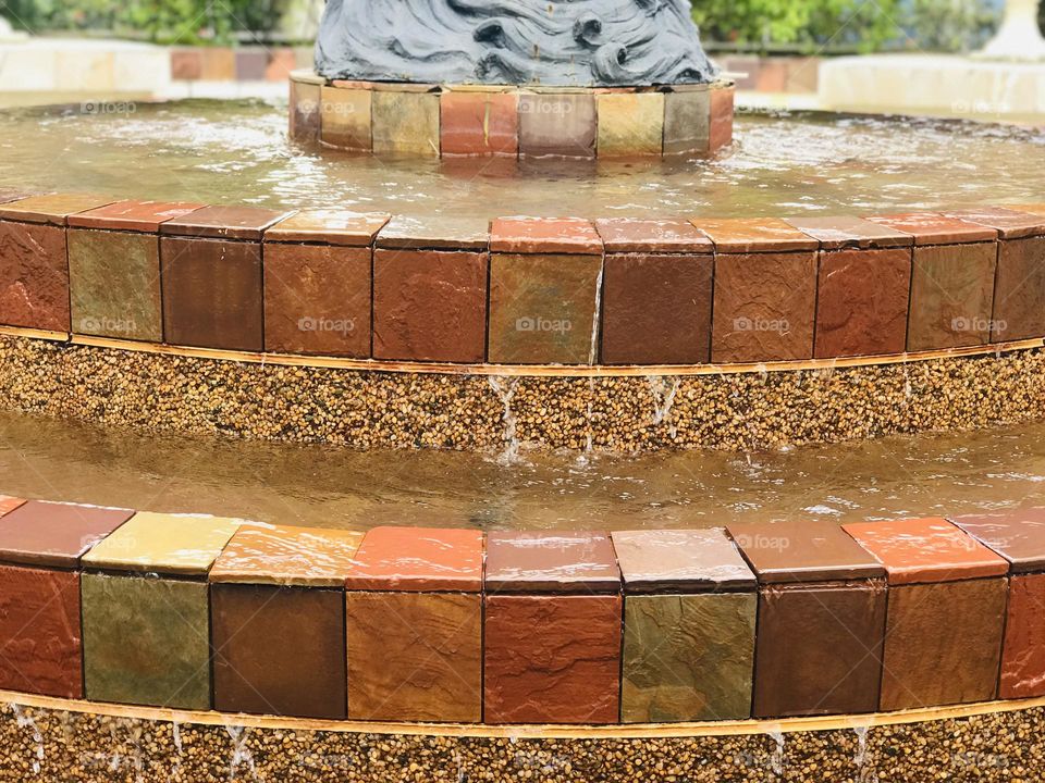 Water fountain and flowing water from steps 