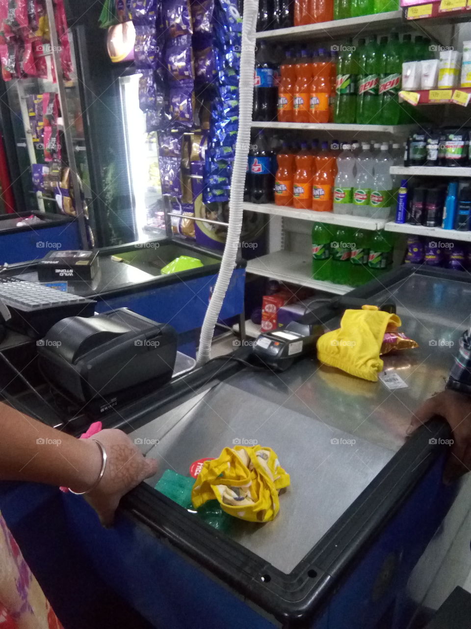 people in small business- cash counter in a big stor