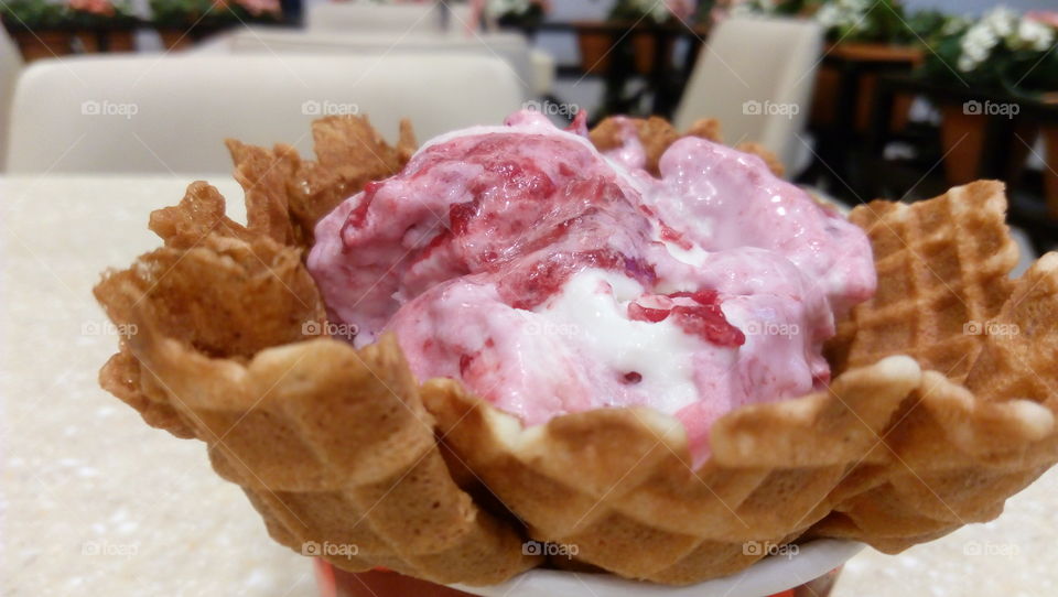 Berry Berry Berry Ice cream. Berry and raspberry flavours on vanilla ice cream in a bowl of biscuit.