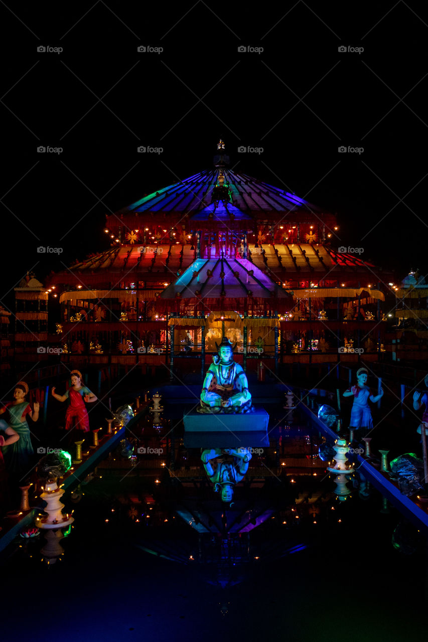 The artificial light of Durga Pandal makes it so beautiful in night.