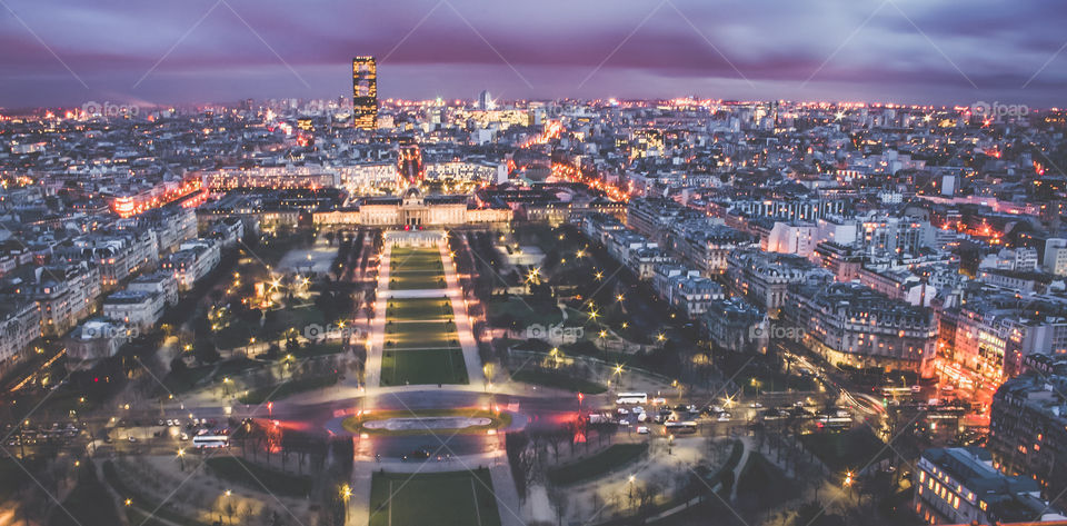 The view from up above Paris at night from the Eiffel Tower