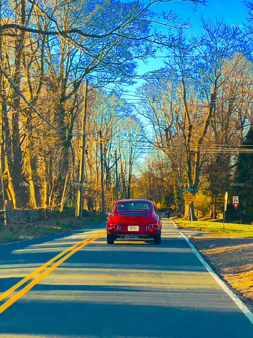 1960’s Porsche cruising down the backroads on a beautiful fall day