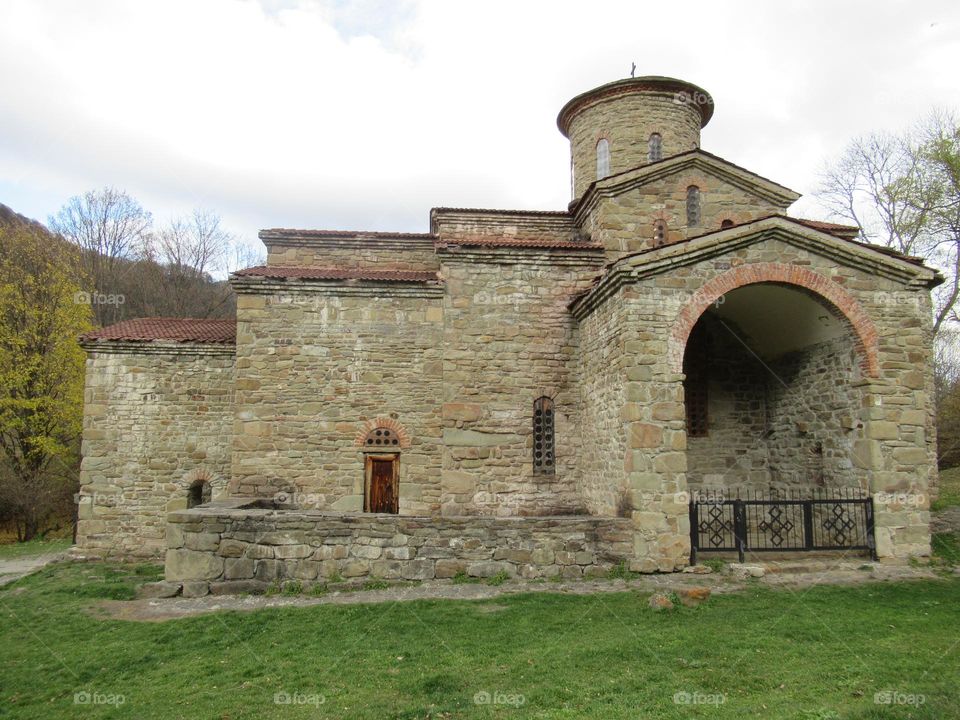 ancient dilapidated temple in the Caucasus in Russia