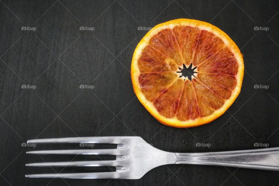 Fork & orange